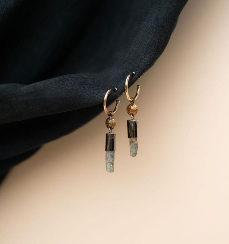 Akh Earrings