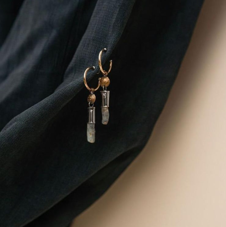 Akh Earrings