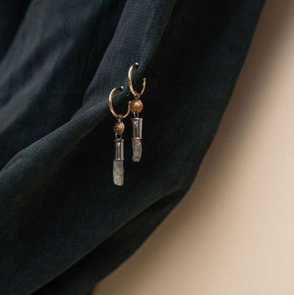 Akh Earrings